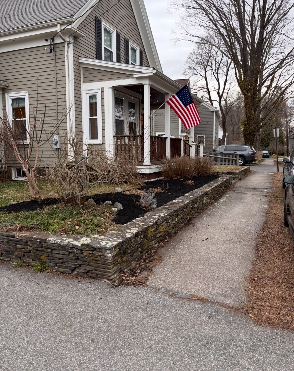 Front beds cleaned with mulch laid down for a crisp finish
